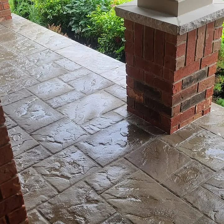 Interlock patio with brick pillar, project completed by the business